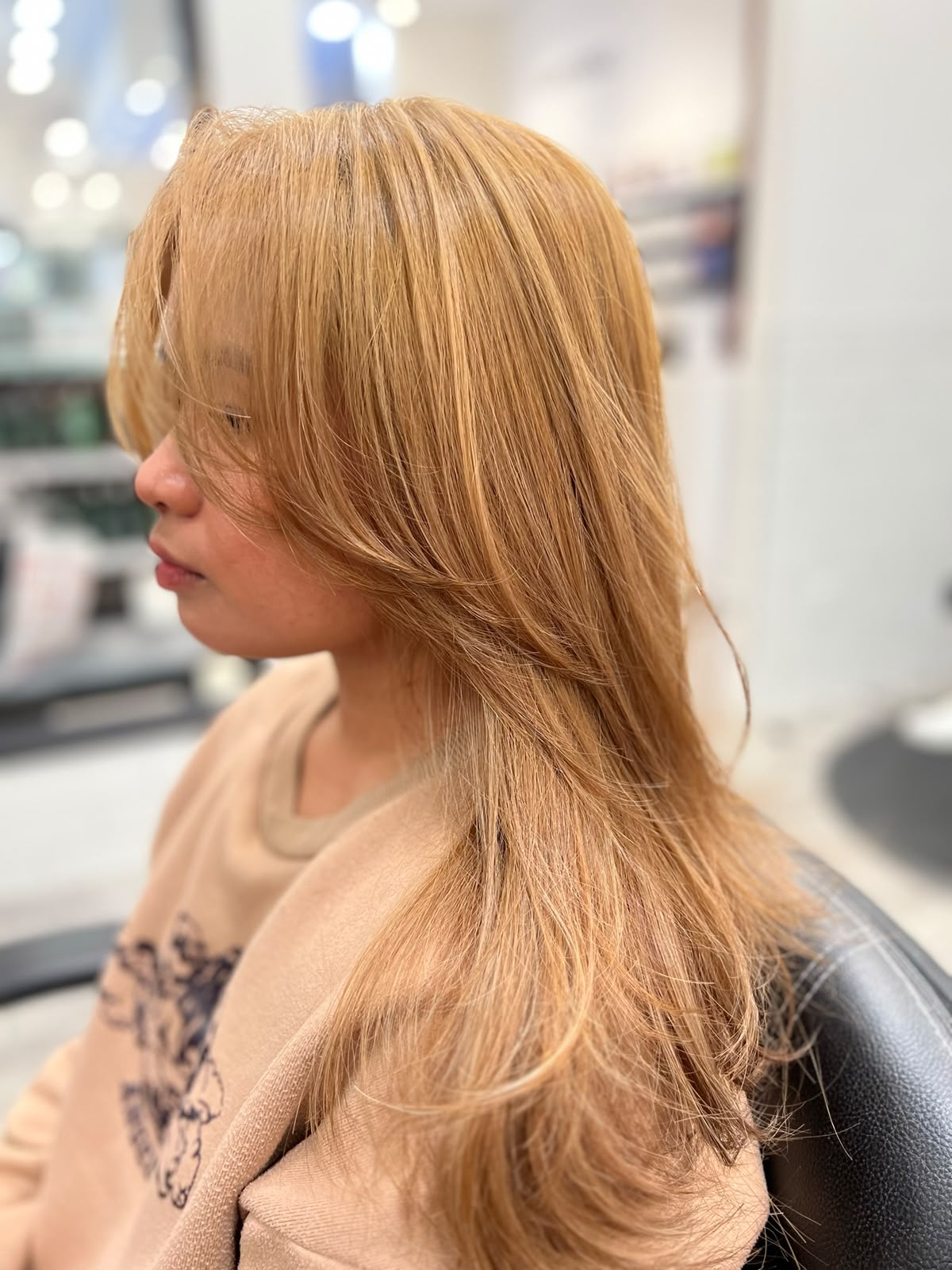 Golden blonde layers by Kelly May at Shear Bliss